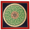 Close up of a colorful hand painted thangka mandala with script patterns