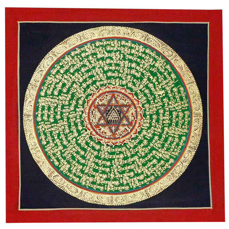Close up of a colorful hand painted thangka mandala with script patterns