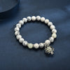 Luminous Lotus Bracelet with Turquoise Glowstone Beads
