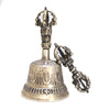 Full view of a copper meditation bell and vajra dorje set with engraved details