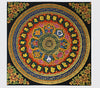 Square cloth wall hanging with colorful circular mandala and Tibetan script