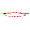 A multicolored braided cotton rope bracelet with gold-tone beads and tassels on a white background