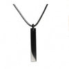 Minimalist black obsidian crystal pendant hanging on a thin black cord