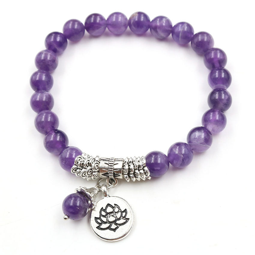 Purple amethyst beaded bracelet with silver tone lotus pendant