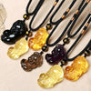 Carved Pixiu pendant necklace in various crystal colors on a black cord
