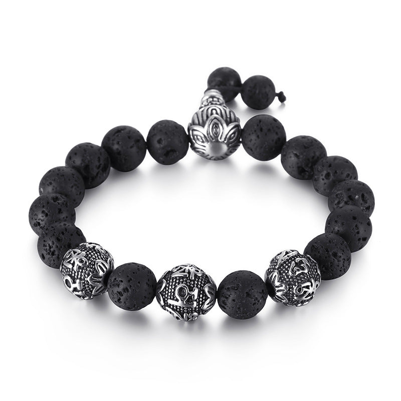 Close up of a tiger eye bead bracelet with silver tone mantra beads