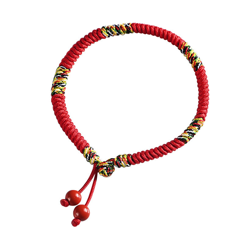 Red woven cord bracelet with multicolor knots and tassel ends