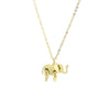 Gold tone titanium steel necklace with a small elephant pendant resting on a white frame