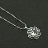 Silver tone necklace with octagonal Bagua pendant featuring Yin Yang symbol