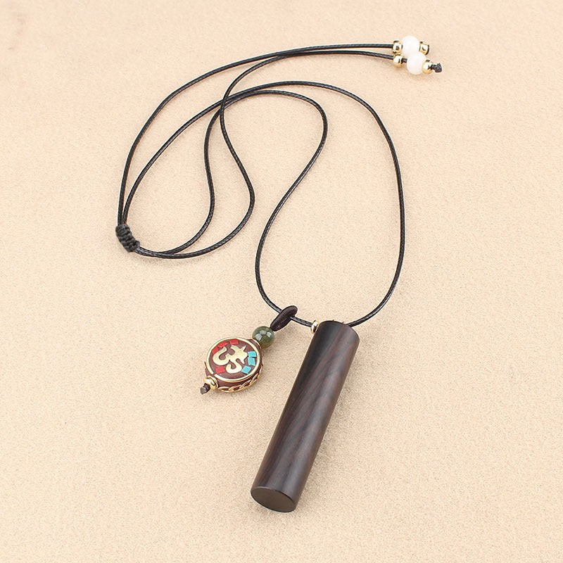 Ebony Wood Dragon Pillar Necklace with Peace Buckle Charm