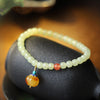 Hetian Jade Bracelet with Amber Pumpkin Charm