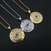 Gold and silver Eye of Horus pendants on chains