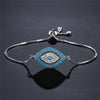 Evil eye protection bracelet with blue zircon stones on a silver-tone chain