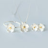 Silver tone cherry blossom flower necklace pendant on a chain