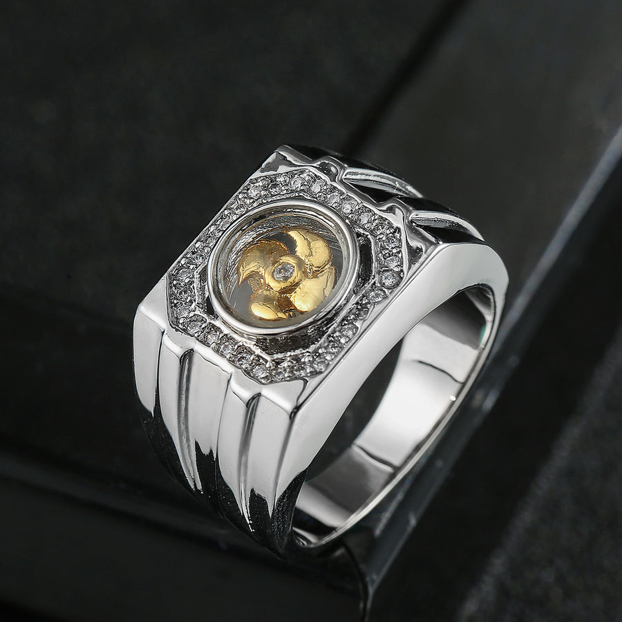 Silver tone copper ring with gold windmill center and stone border