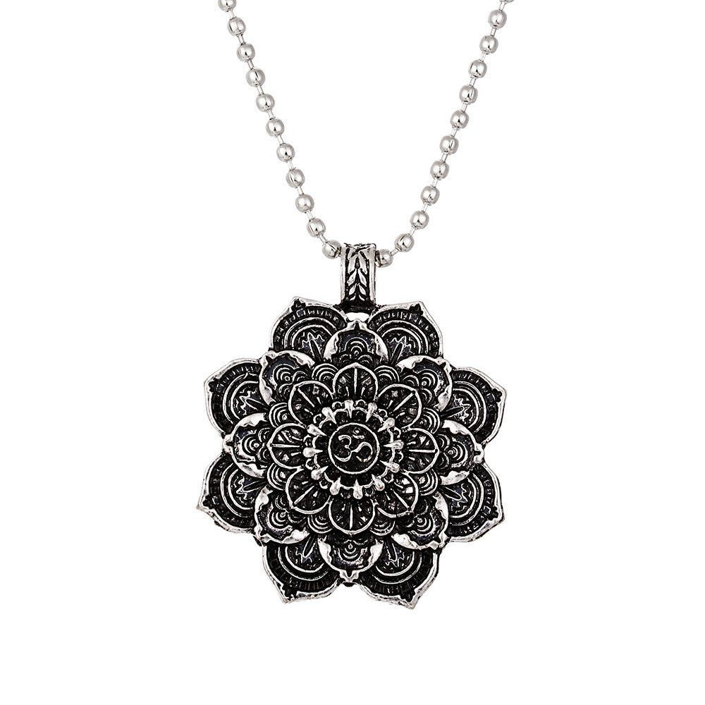Silver-tone alloy necklace with a large lotus mandala pendant featuring an Om symbol
