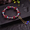 Garnet Cluster Bracelet with Gold-Tone Chain and Floral Accents