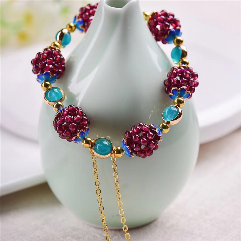 Garnet Cluster Bracelet with Gold-Tone Chain and Floral Accents