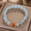 Blue Chalcedony Bracelet with Gold-Tone Charm