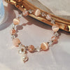 Crystal and Cat's Eye Charm Bracelet with Star, Moon and Flower Beads