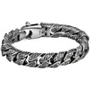 Silver tone bracelet with carved flower pattern and Pixiu head charm on a book background