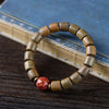 Natural Sandalwood Bead Bracelet with Lacquer Accent