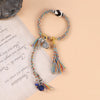 Tibetan Style Dzi Bead Braided Bracelet with Tassel