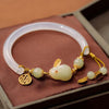 Interlocking Peace Buckle Bracelet, Faux Jade Beads