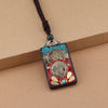 Ebony Wood Pendant Necklace with Buddhist Symbols