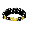Black beaded bracelet with gold dragon and pixiu charms on white background
