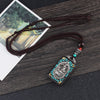 Ebony Wood Pendant Necklace with Buddhist Symbols