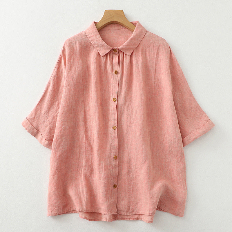 Pink and light purple women's half sleeve shirts laid flat on a white background