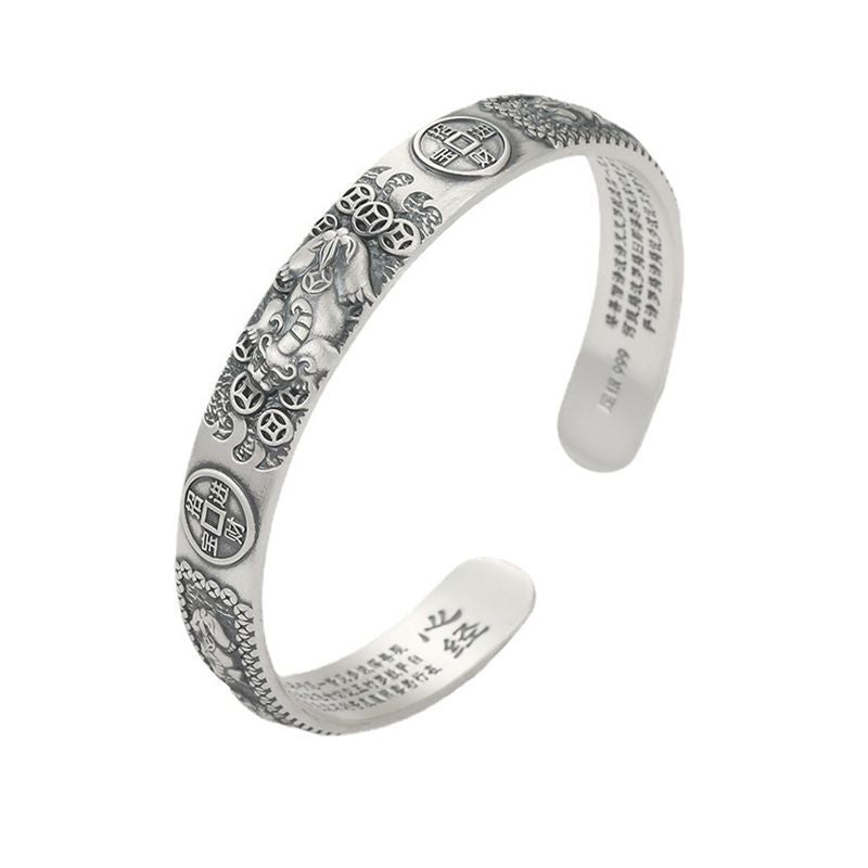 Silver-tone open cuff bracelet with Pixiu and coin engravings