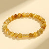 Tiger Eye Charm Bracelet with Koi, Bamboo and Mantra
