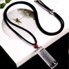 Clear quartz cylinder pendant engraved with Buddhist mantras on a black cord