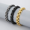 Three stainless steel bracelets with a dragon bone pattern on a wrist