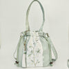 Embroidered Canvas Crossbody Bag with Tassels