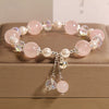 Pink Crystal and Pearl Bracelet with Bell Charm