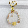 Crystal Charm Keychain with Rutilated Quartz and Super Seven