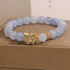 Blue Crystal Butterfly Bracelet with Gold-Tone Accents