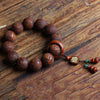 Wood Bead Bracelet with Engraved Charms and Tassel