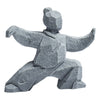 Grey stone-textured figurine of a person in a Tai Chi martial arts pose