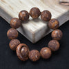 Wood Bead Bracelet with Engraved Charms and Tassel