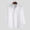 White long sleeve cotton shirt with a stand collar and half button placket on a hanger