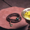 Bodhi Seed Bracelet with Green Guru Bead and Spiral Charm