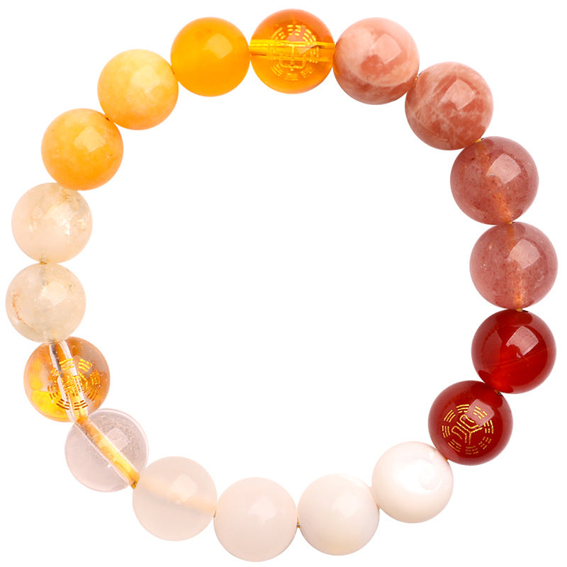 Close up of a multi-colored natural crystal beaded bracelet with gold accent beads