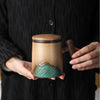 Ceramic Tea Cup with Infuser and Wooden Handle