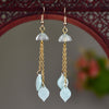 Long Drop Earrings with Floral Charm and Faux Pearl