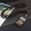 Ebony Wood Pendant Necklace with Buddhist Symbols