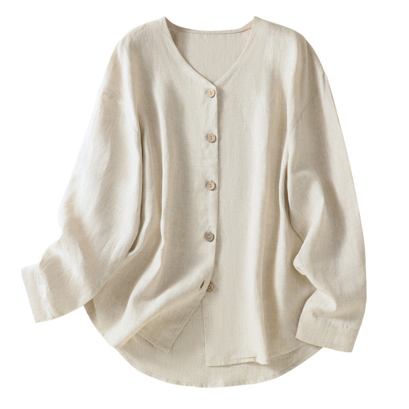 Cream colored long sleeve linen shirt with v-neck and buttons